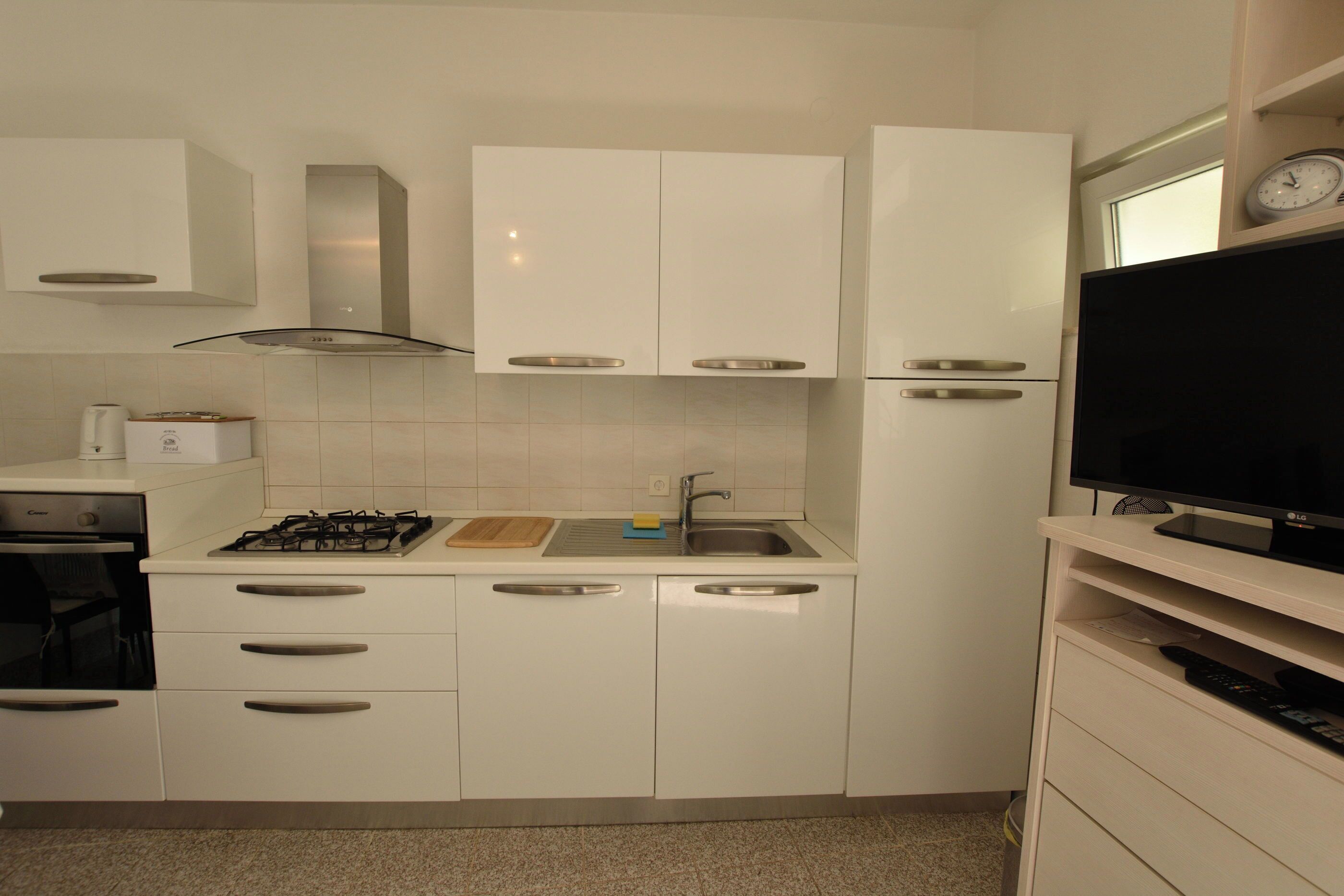 Apartamento (A1) | Cocina privada | Frigorífico, horno, placa de cocina y lavavajillas