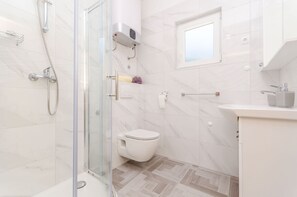 Bañera, secador de pelo