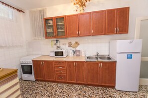Private kitchen | Fridge, microwave, stovetop, espresso maker - Apartment Anka (Primosten)