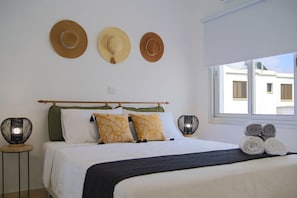 Apartamento | 2 quartos, quartos à prova de som, Wi-Fi de cortesia, roupa de cama