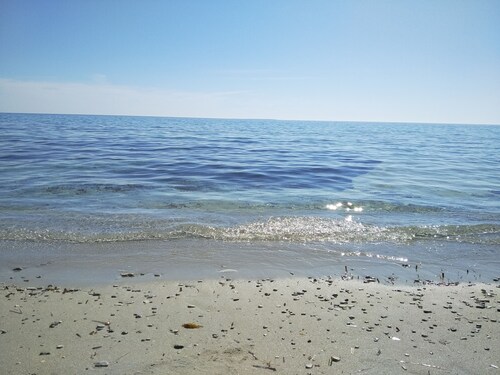 A few steps from the white beach, crystal clear sea