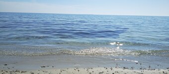 A few steps from the white beach, crystal clear sea