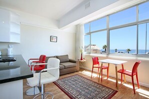 Appartement de base, 1 chambre | Aire de séjour | Téléviseur à écran plat