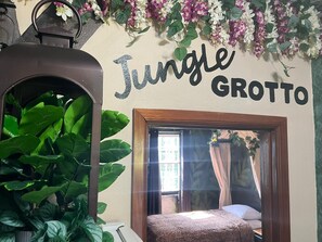 Jungle Grotto Room | Premium bedding, in-room safe, individually decorated - Belize Budget Suites (San Pedro)