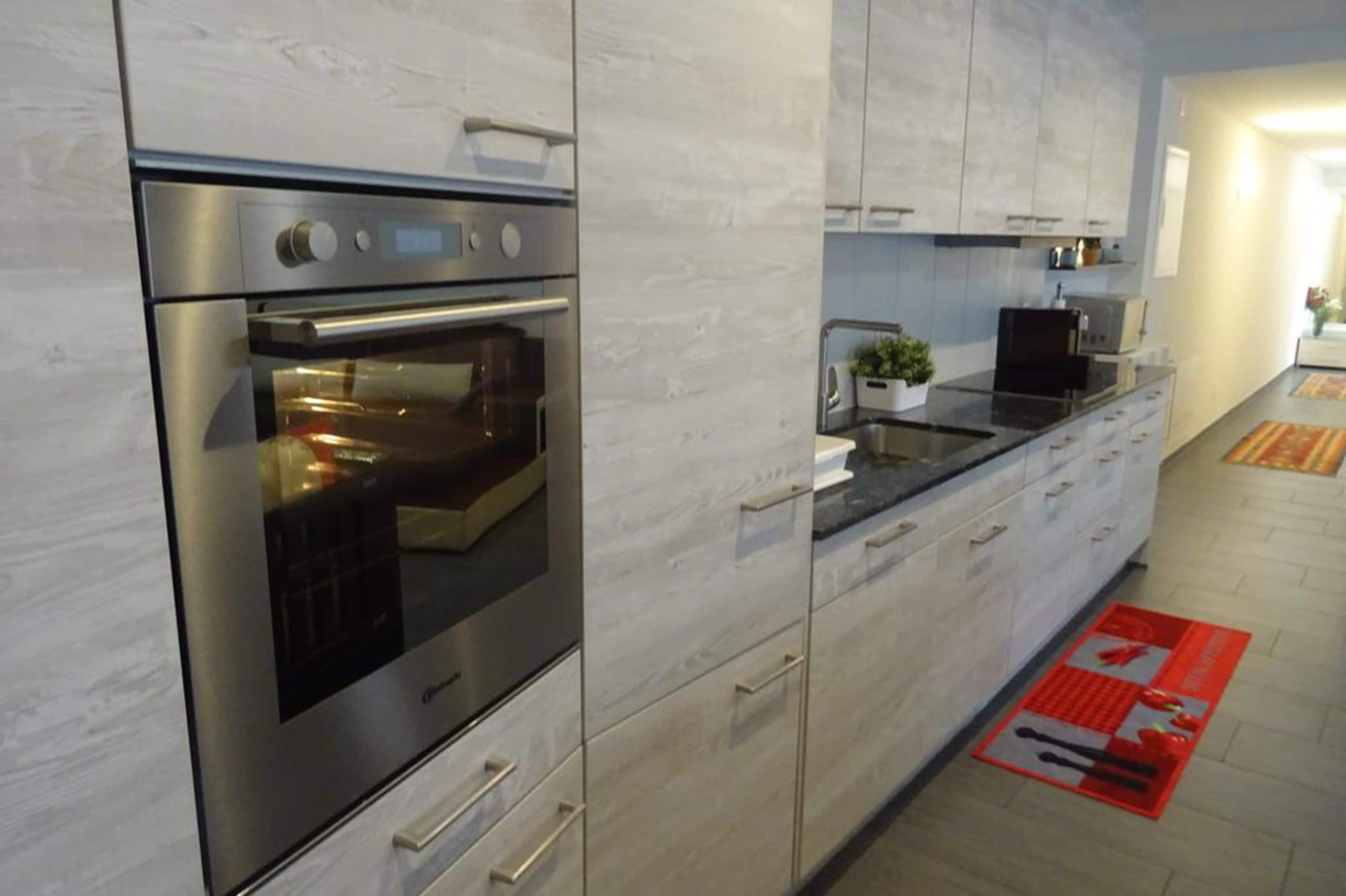 Apartment, 3 Bedrooms | Private kitchen | Full-sized fridge, microwave, oven, stovetop