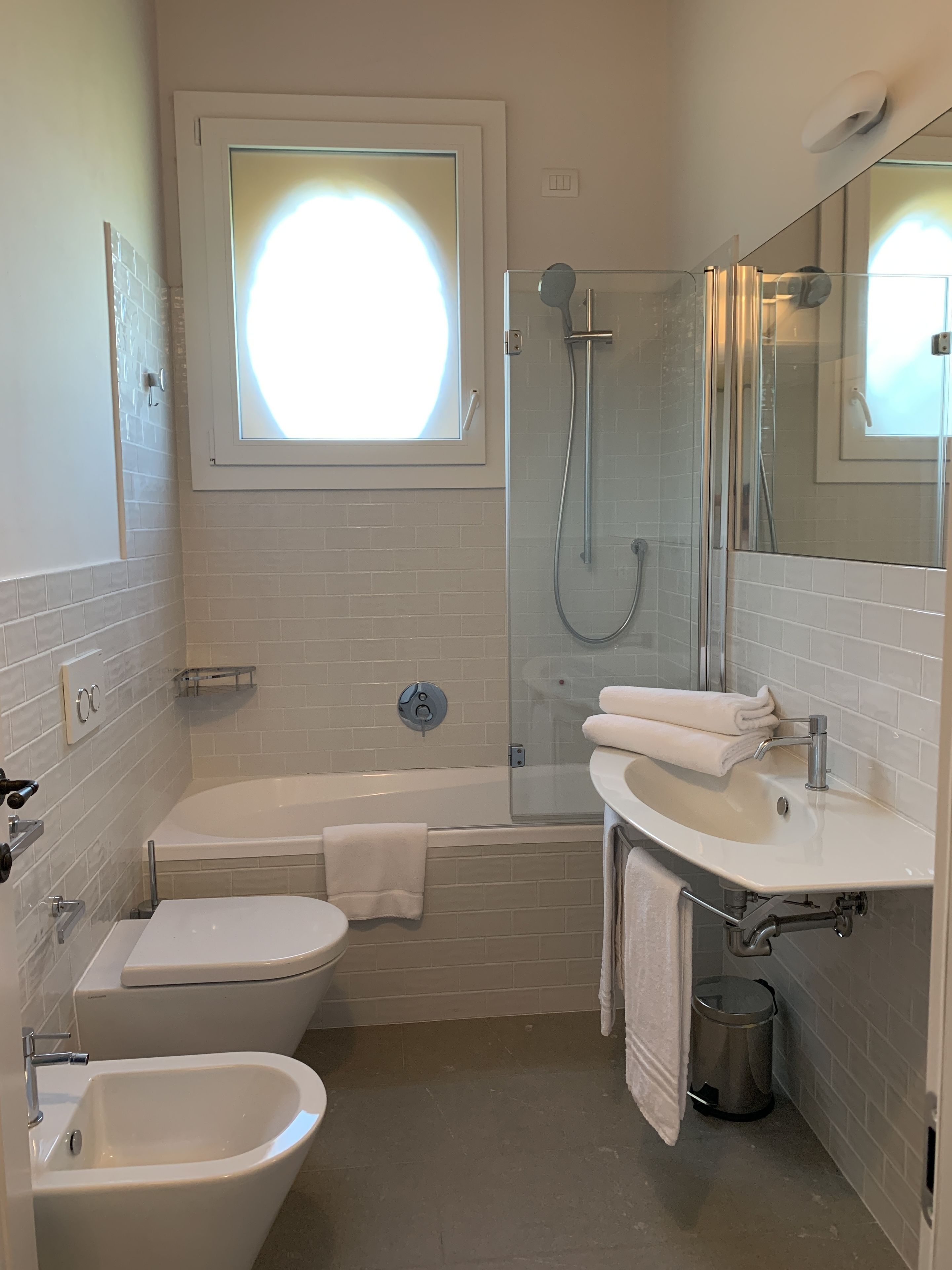 superior room | bathroom | shower, free toiletries, hair dryer, bidet