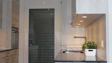 Apartment, 3 Bedrooms | Private kitchen | Full-sized fridge, microwave, oven, stovetop