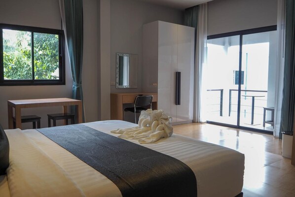 Desk, laptop workspace, blackout curtains, free WiFi