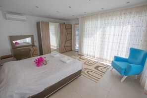Villa, 4 Bedrooms | 4 bedrooms, desk, laptop workspace, iron/ironing board - Villa Ciragan 521 by Eva Bodrum (Kas)