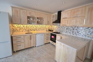 Villa, 4 Bedrooms | Private kitchen | Full-size fridge, microwave, oven, stovetop - Villa Ciragan 521 by Eva Bodrum (Kas)