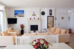 Villa | Living area | Flat-screen TV