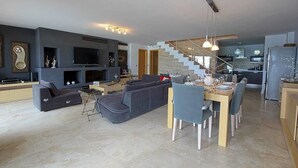 Villa | Living area | Flat-screen TV