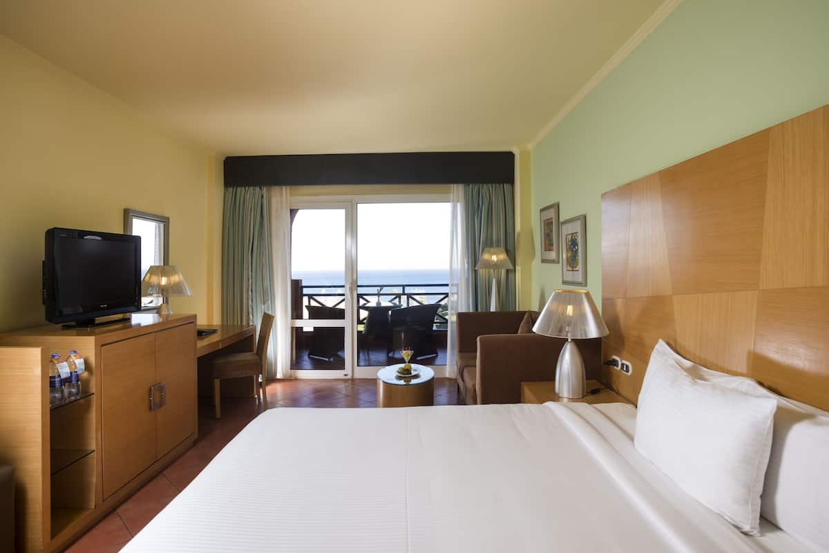 Superior Double Room, Sea View | Minibar, in-room safe, iron/ironing board, bed sheets