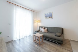 Apartment, Sea View | Living area