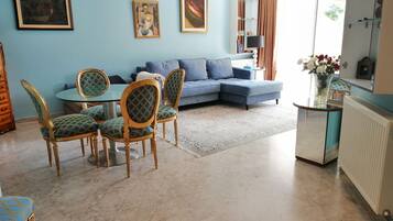 Luxury Apartment | Living area | Flat-screen TV