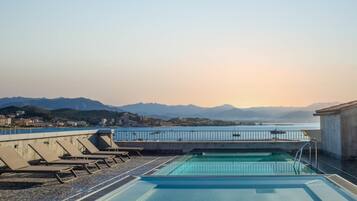 Seasonal outdoor pool, open 10:00 AM to 8:00 PM, sun loungers