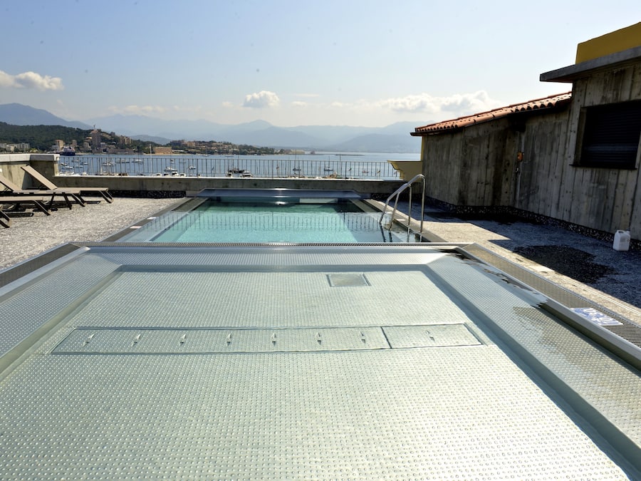 Seasonal outdoor pool, open 10:00 AM to 8:00 PM, pool loungers