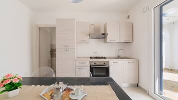 Comfort Apartment, 1 Bedroom (Bilo 2 - 1408) | Private kitchen | Full-sized fridge, oven, stovetop, cookware/dishes/utensils