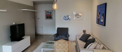 Luxury-Apartment | Wohnbereich | Flachbildfernseher