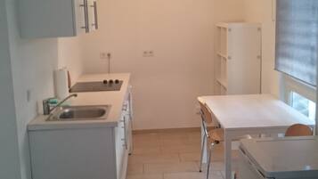 Apartment (F2) | Private kitchen | Fridge, microwave, stovetop, coffee/tea maker