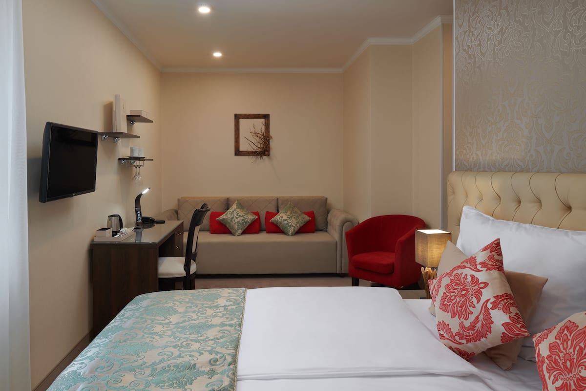 Comfort kamer (PLUS) | Lakens van Egyptisch katoen, luxe beddengoed, een kluis op de kamer