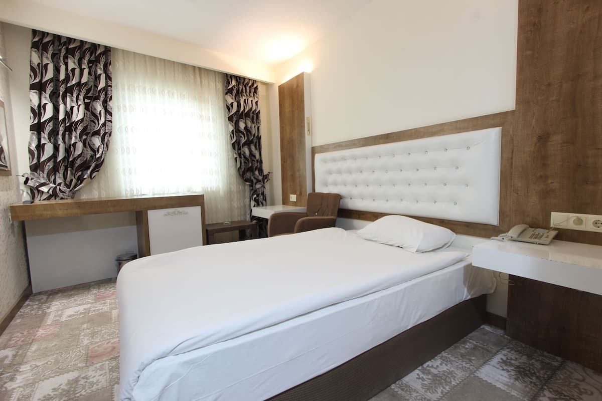 Single Room | Minibar, desk, iron/ironing board, free cots/infant beds