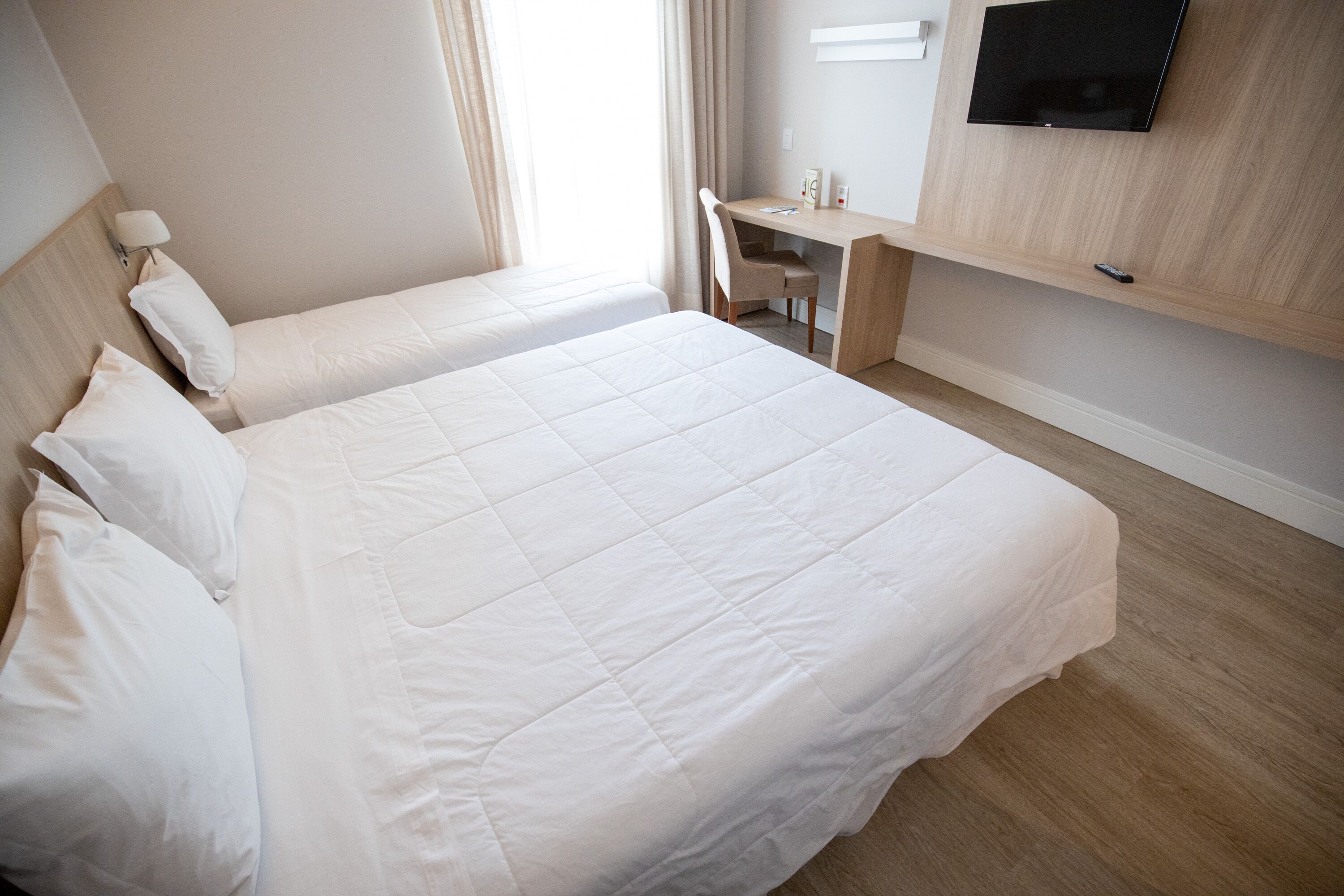 deluxe triple room, multiple beds | egyptian cotton sheets, premium bedding, pillow-top beds, minibar