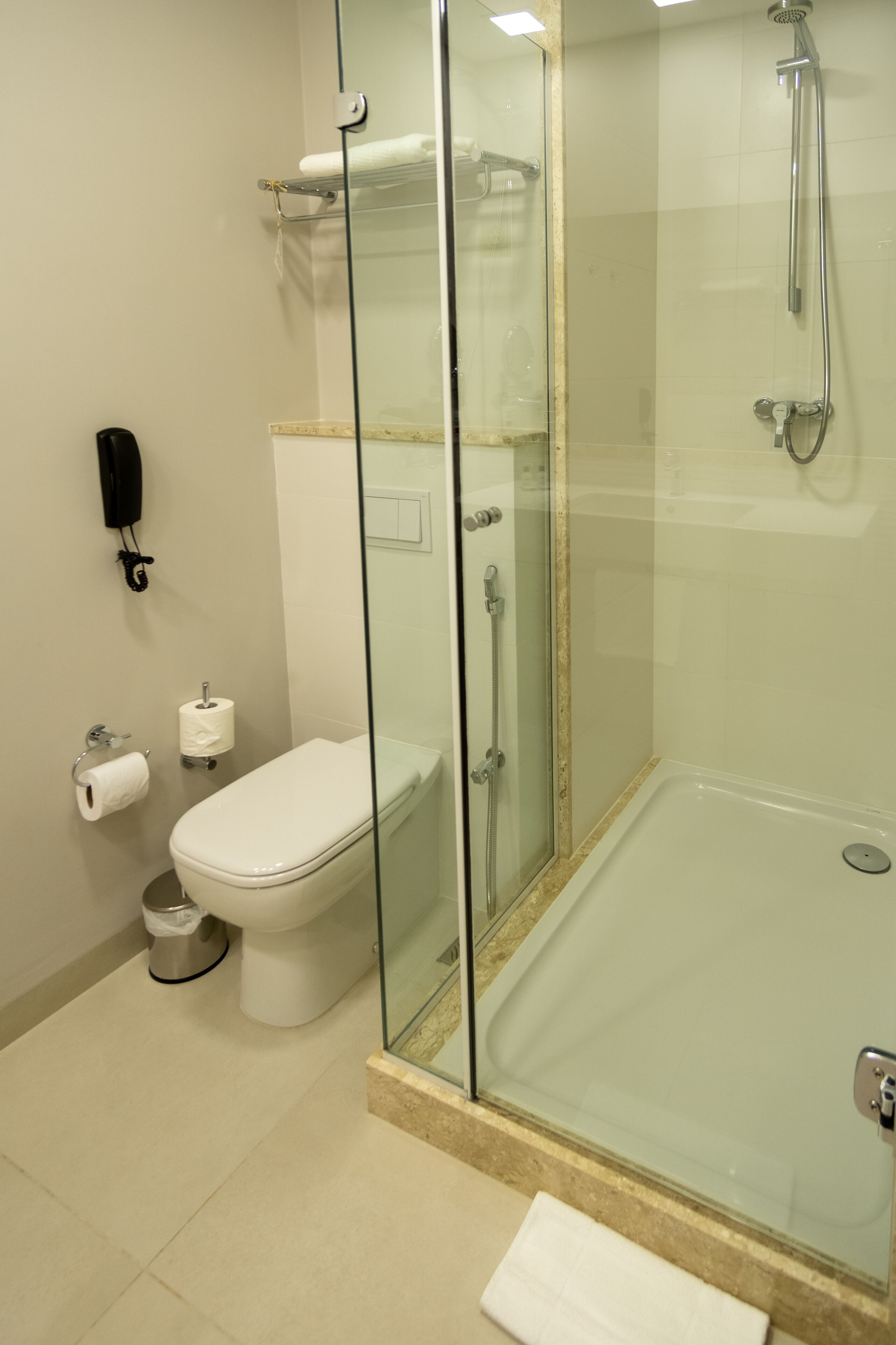 deluxe triple room, multiple beds | bathroom | designer toiletries, hair dryer, towels, soap