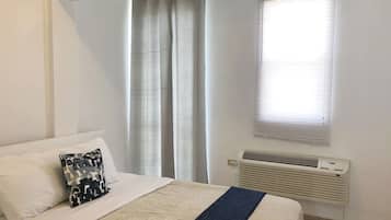 1 slaapkamer, een strijkplank/strijkijzer, wifi, beddengoed