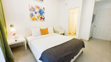 1 habitación, tabla de planchar con plancha, wifi gratis y ropa de cama