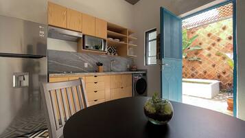 Full-size fridge, microwave, oven, blender