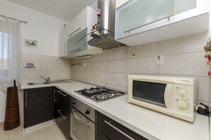 Eget kjøkken | Kjøleskap, mikrobølgeovn, kokeplater og kaffetrakter/tekoker