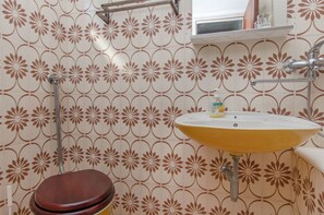 Bathroom | Bathtub, towels, soap, toilet paper