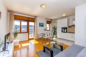 Apartment (A2) | Private kitchen | Fridge, microwave, oven, stovetop