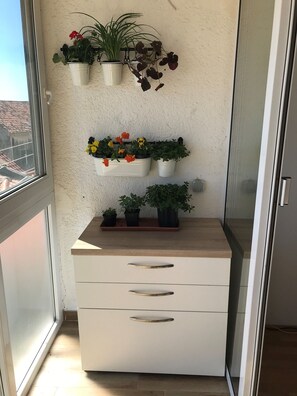 Fer et planche à repasser, draps fournis