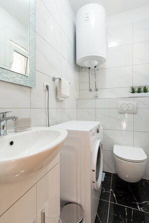 Appartement (A1) | Salle de bain | Douche, séchoir à cheveux