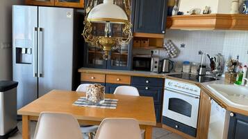Apartment (A2) | Private kitchen | Fridge, microwave, oven, stovetop