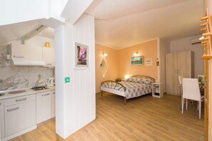 Apartment (A1) | Private kitchen | Fridge, microwave, stovetop, electric kettle