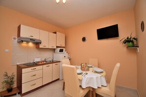 Apartment (A1) | Private kitchen | Fridge, microwave, stovetop, espresso maker