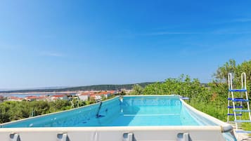 Outdoor pool, sun loungers