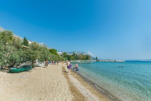 Enjoy a serene beach experience with access to the ocean and a variety of recreational activities.