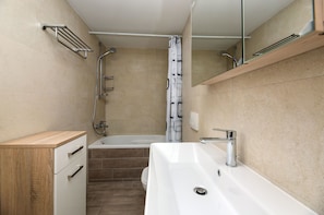 Apartment (A1) | Bathroom | Shower, toilet paper