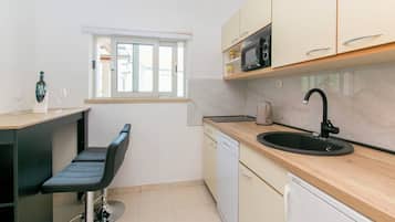 Leilighet (A1) | Eget kjøkken | Kjøleskap, mikrobølgeovn, kokeplater og oppvaskmaskin