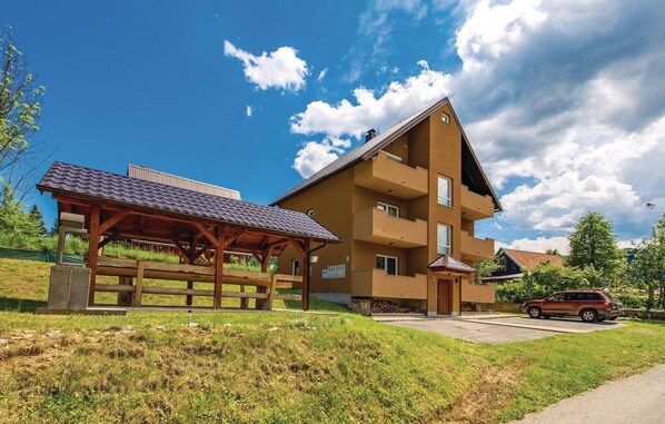 Residents enjoy a balcony with outdoor space on the upper floor.