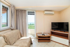 Appartement (A4) | Woonkamer | Televisie