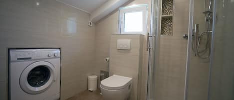 Bathroom | Shower, free toiletries, hair dryer