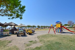 Enjoy a fun-filled day at our playground with a slide and climbing structures.