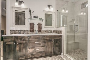 Combined shower/tub, hair dryer, towels, soap