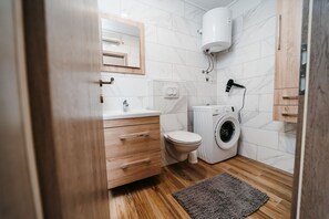 Bathroom | Shower, towels, soap, toilet paper