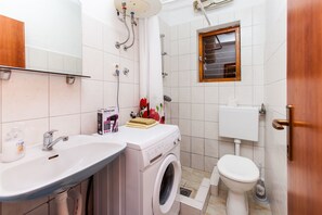 Baño | Secador de pelo y toallas